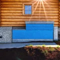Фото по теме: Как сделать утепление отмостки и цоколя дома из бруса